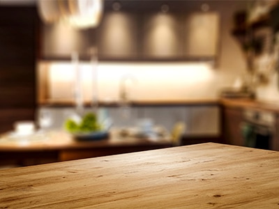 Countertop with blurry kitchen behind