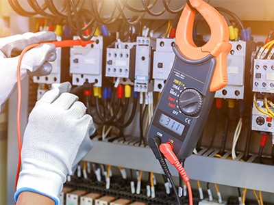 Person repairing wires
