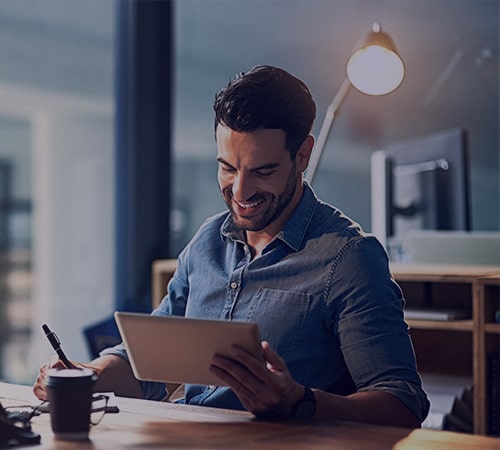 Man holding an iPad